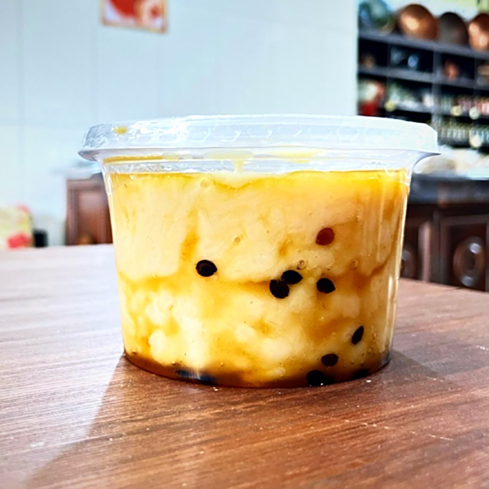 Pote de cocada cremosa com maracujá