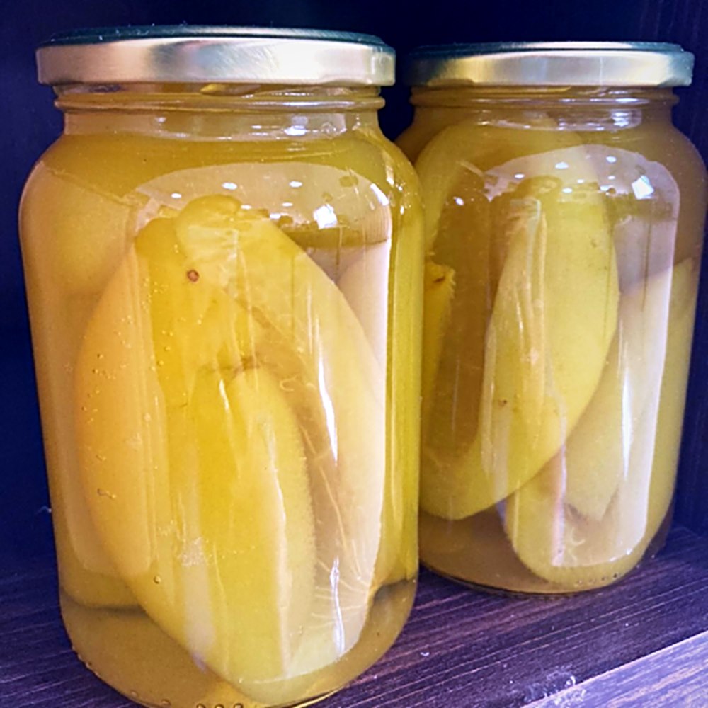 Vidros de laranja em calda